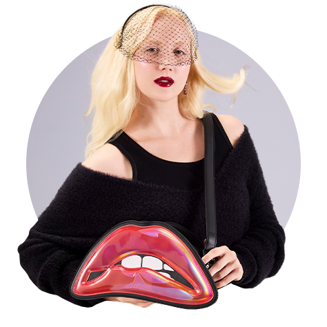 Circle cropper photo with model showcasing Loungefly Horror collection with Rocky Horror Picture Show crossbody