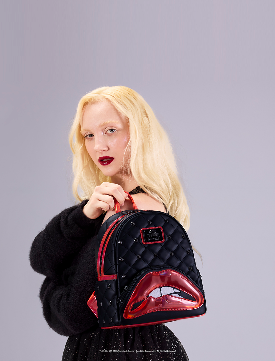 Gray background with model showcasing Loungefly Rocky Horror Picture Show collection