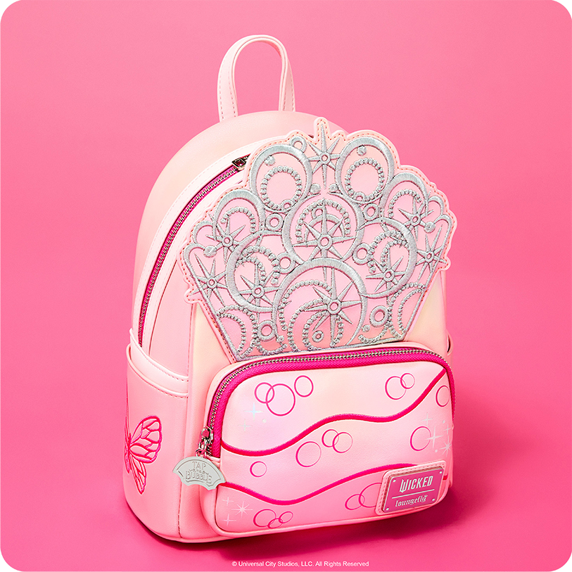 Pink background featuring Loungefly Wicked: For Good Glinda Exclusive Mini Backpack